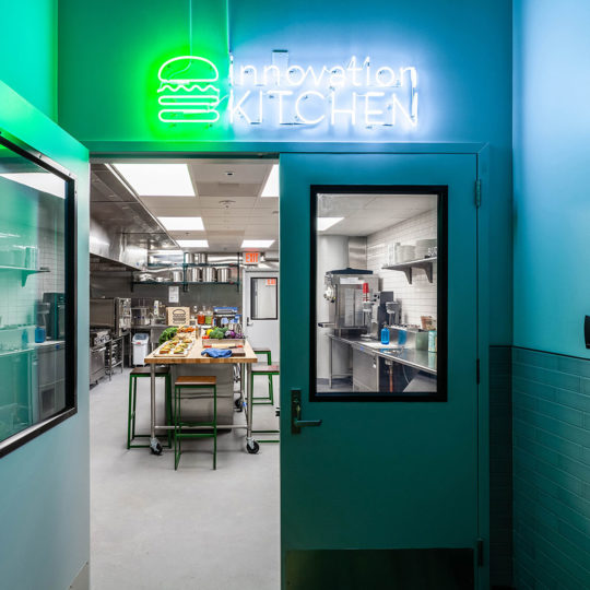 Innovative Kitchen neon sign and open doorway