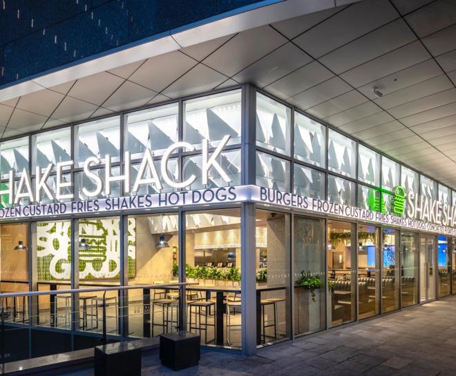 Exterior of Shake Shack at night